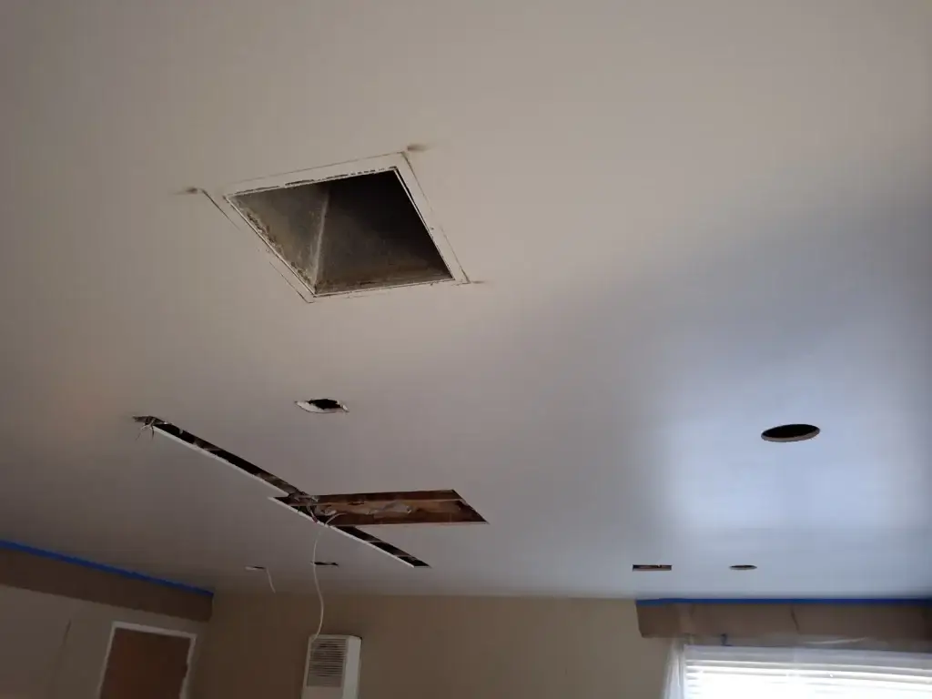 Access slots cut in ceiling