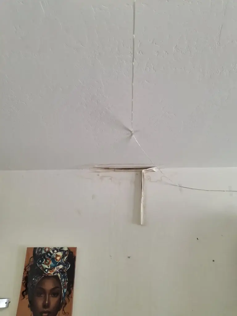 Cracked ceiling junction from leak