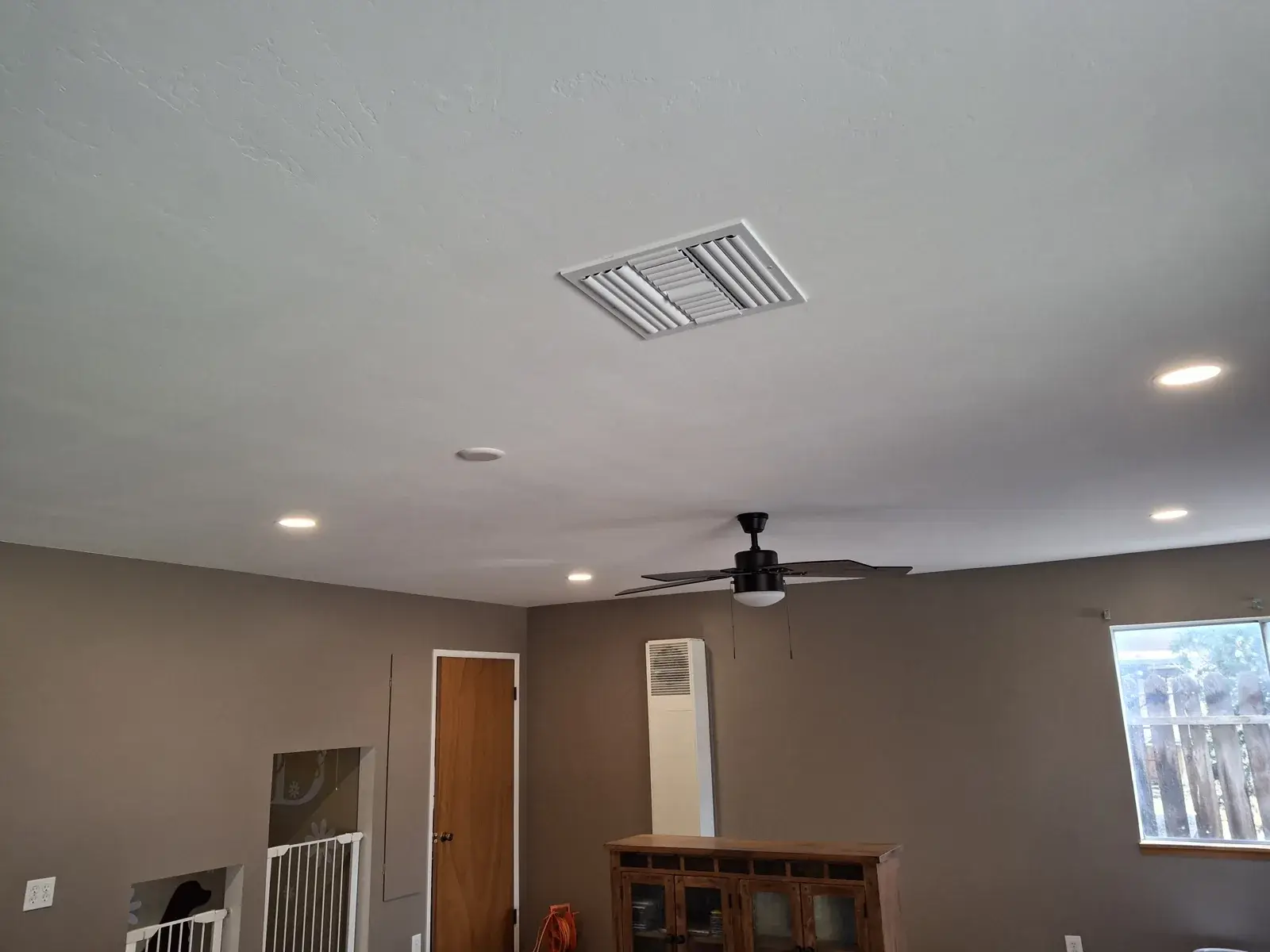 Finished living room after drywall repairs