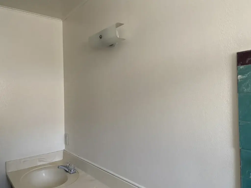 Repaired bathroom wall corner