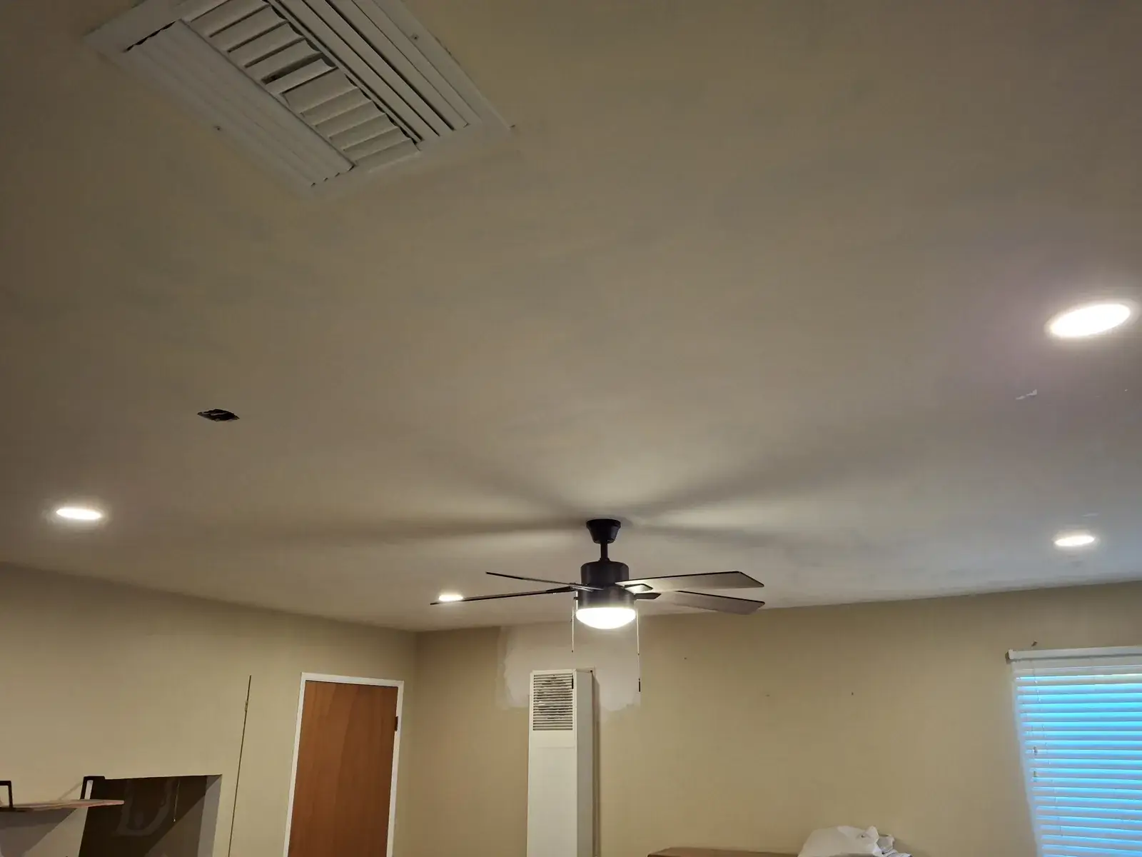 Skim-coated ceiling