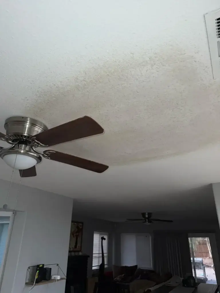 Water-stained ceiling before repair